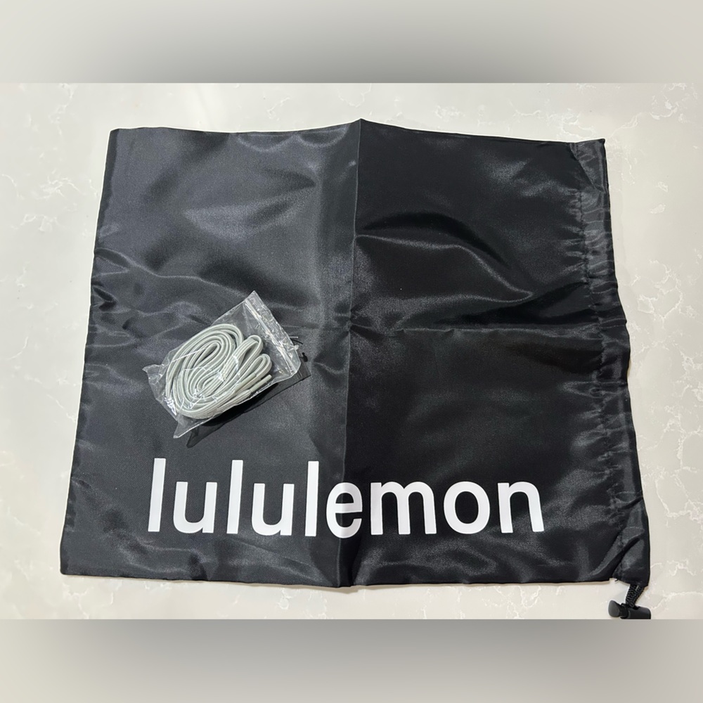 New LuLuLemon sneaker dust bag and gray laces